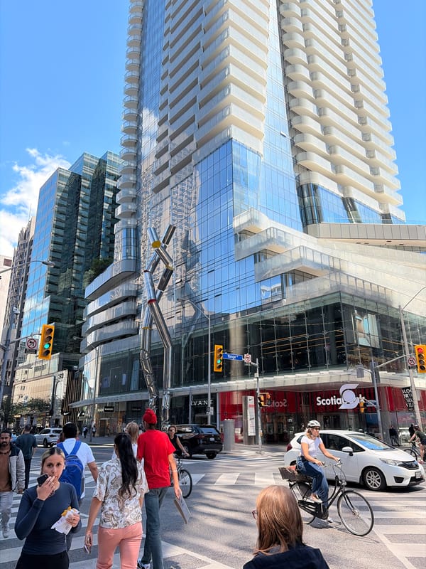 Pride parade energy meets luxury retail on a sunny Toronto afternoon