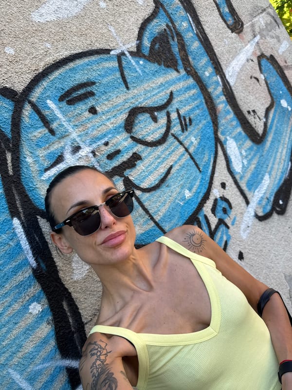 Person photographed lying on graffiti-covered concrete in Pleven, Bulgaria
