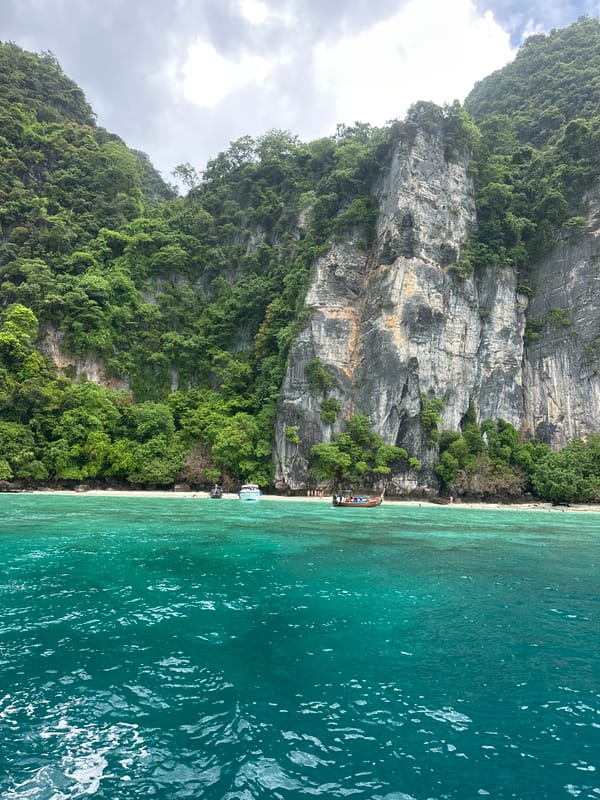 Boats, cliffs, and clear water around Ao Nang