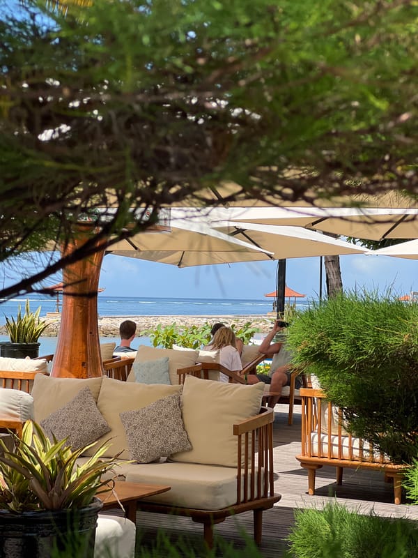 Morning scenes document quiet resort and beach life in Denpasar