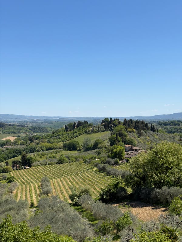 Tourists enjoy sunny spring morning in San Gimignano