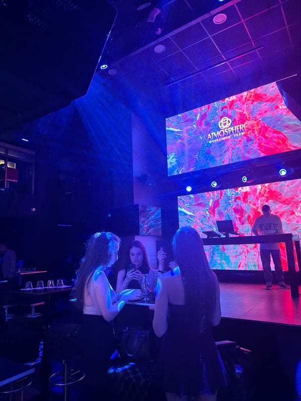 Women chat at bar in Veliko Tarnovo nightclub