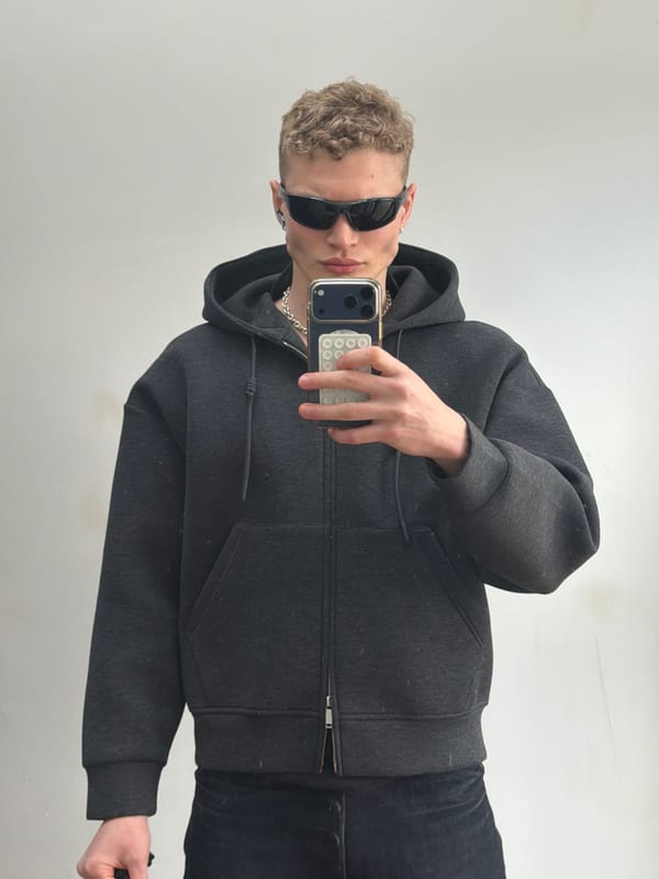 Person takes selfie against wall in London