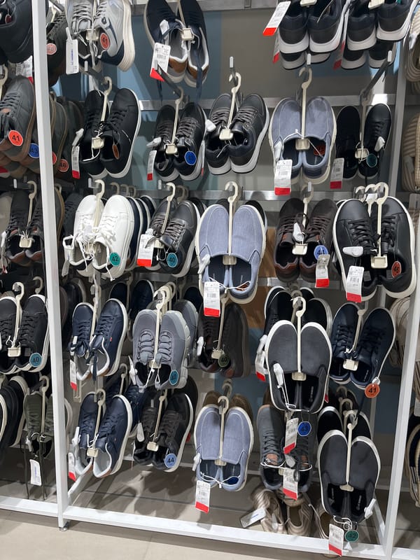 Inside a Kharkiv retail store stocked with clothing and accessories