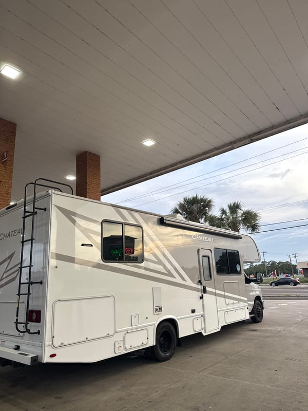 RV stops for gas at Palm Bay station