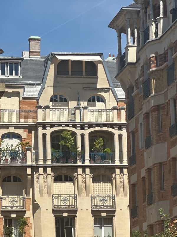 Sunny afternoon stroll through classic Parisian streets and architecture