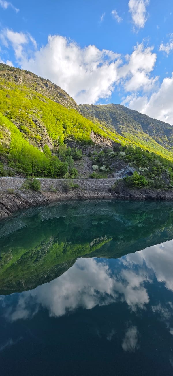 Mountain lake reflections captured in early morning Benasque Spain