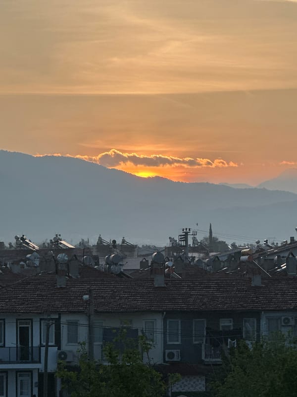 Woman documents morning routine and sunrise in Fethiye, Turkey