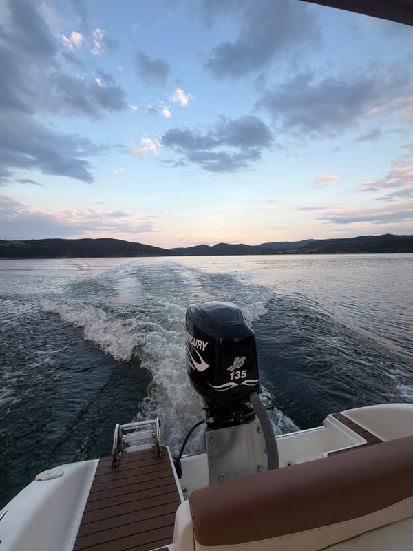 Boating on Glavatartsi reservoir at golden hour, Bulgaria
