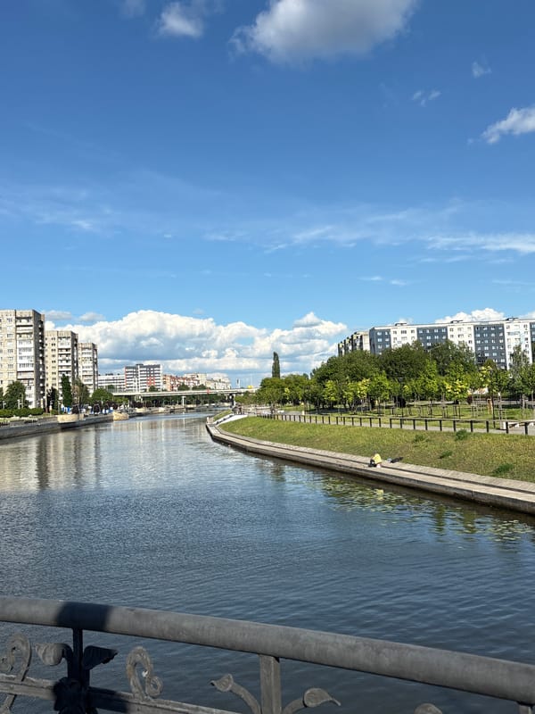 Tourist walk documents sunny afternoon in historic Kaliningrad waterfront