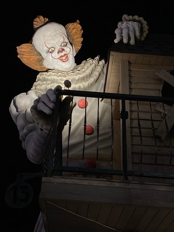Creepy clown statue and glowing pine tree light up Gelendzhik night