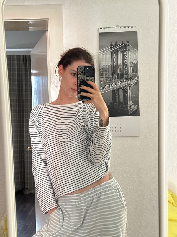 Woman takes morning selfies with face mask in Kiel