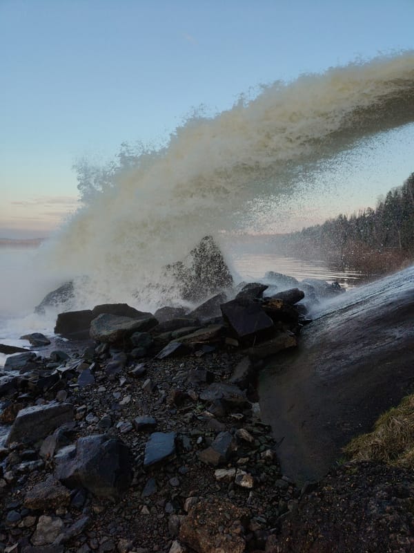 Witnesses capture shoreline waves, street scenes during afternoon hours