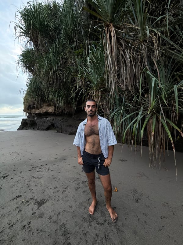 Morning beach activities documented at Selemadeg's black sand coast