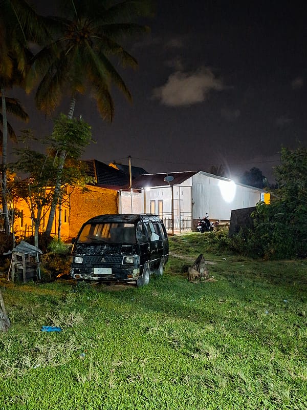 Ordinary life moments captured in Lhokseumawe: damaged van, mangoes, cat