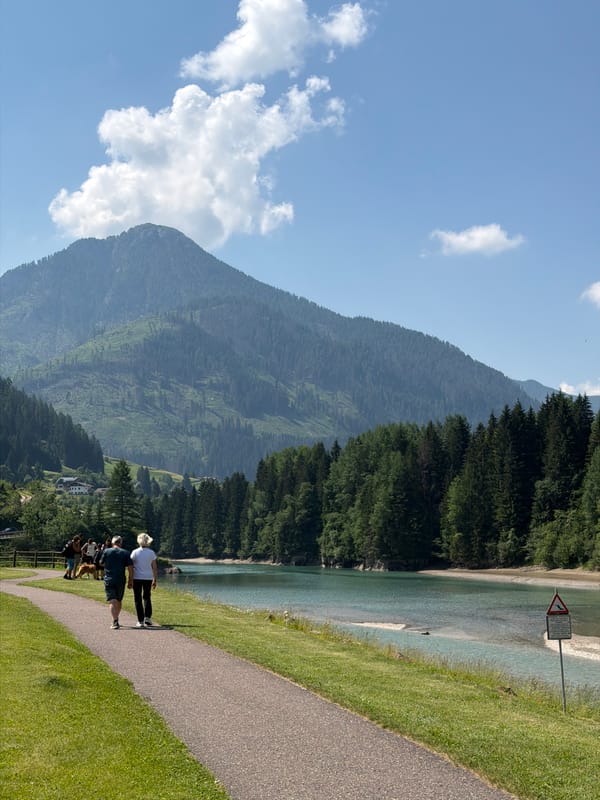 Morning walk along a riverside path in Soraga di Fassa