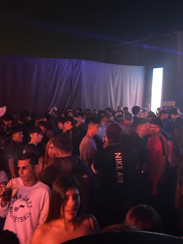 Nighttime concert or party draws crowds at MUMAI venue, Arica