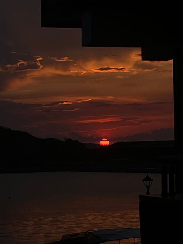 Spectacular sunset draws witnesses to waterfront marina