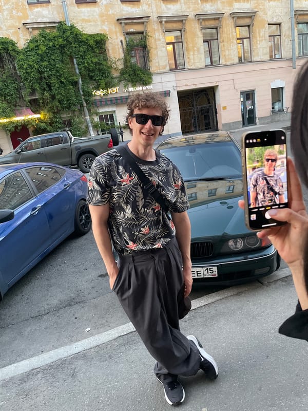 Couple documented during evening walk through central Saint Petersburg