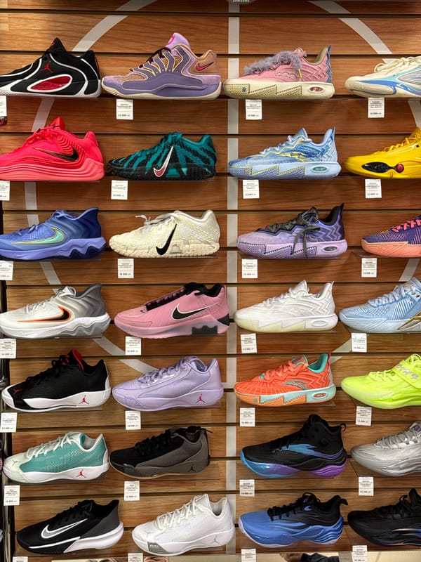 Customer shops sporting goods section in Krasnoyarsk store