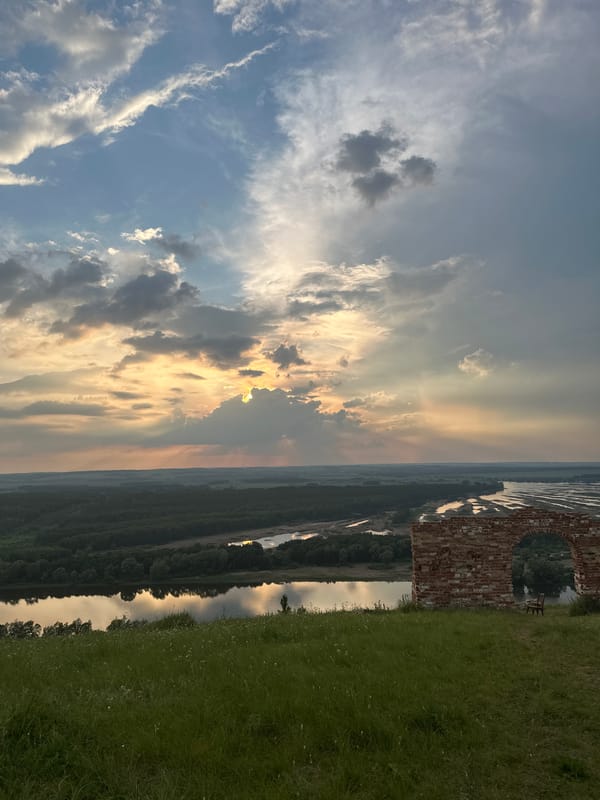 Sunset over a river valley from a hilltop in rural Russia
