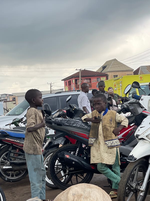 Motorcycle repairs and street life in Jos, Nigeria