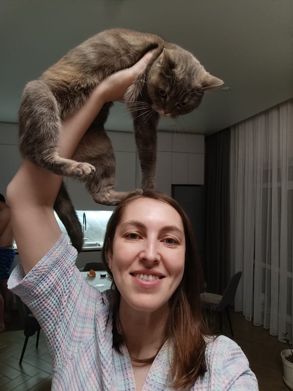 Woman documents daily life with cat in Chaikovsky home