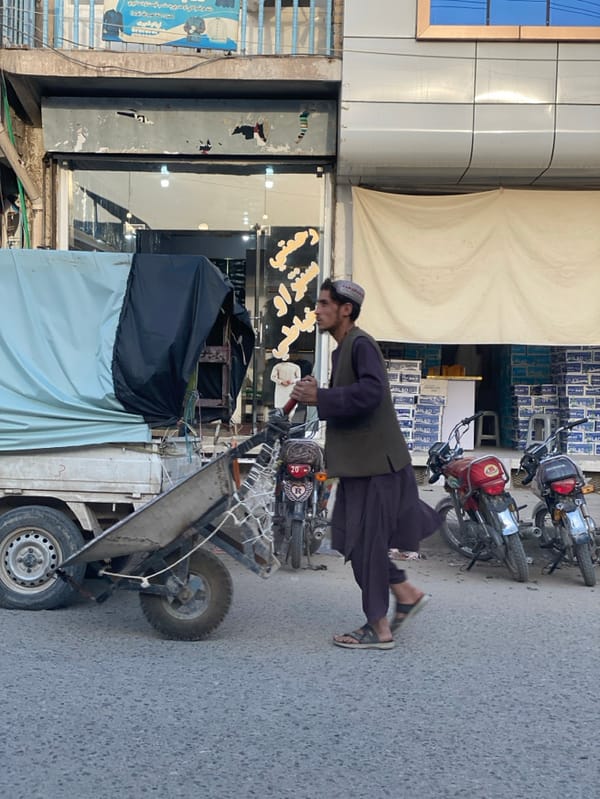 Daily street life captured in Kandahar commercial district