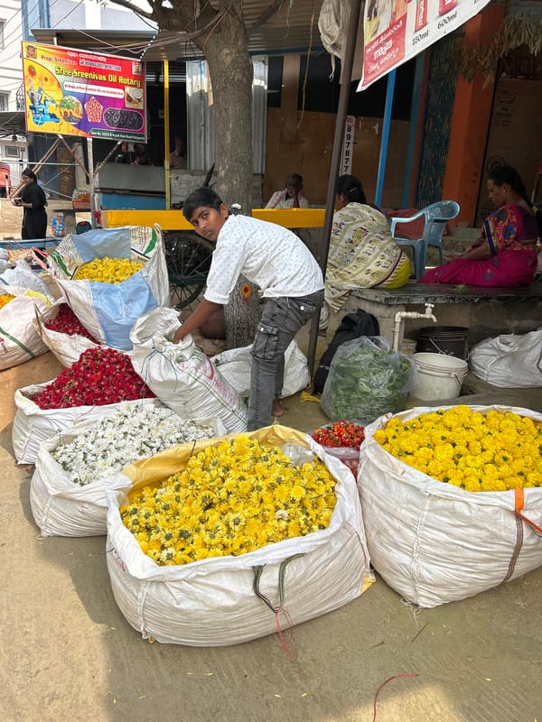 Morning street market activity observed in Puttaparthi, India