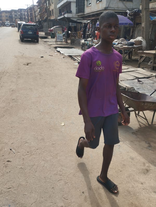 Morning street activity captured in Fegge, Nigeria market area