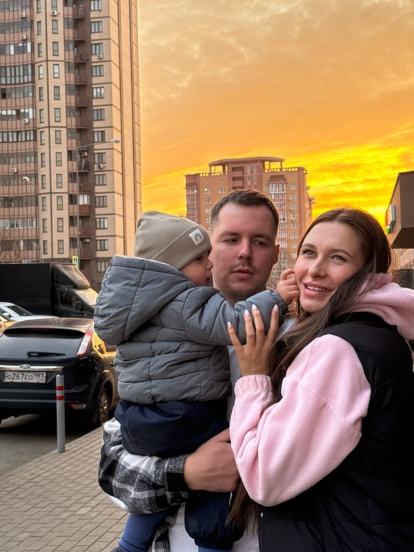 Family photographed during afternoon outing in Moscow's Basmanny District