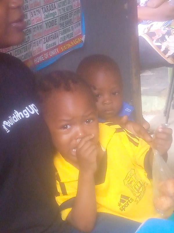 Morning community gathering with children and families in Ikorodu