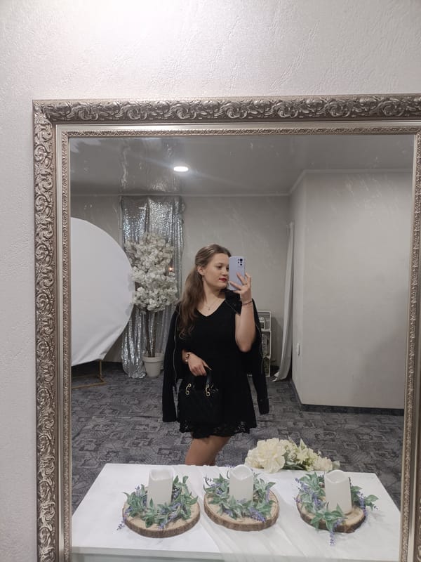 Woman takes mirror selfies at decorated event venue in Plovdiv