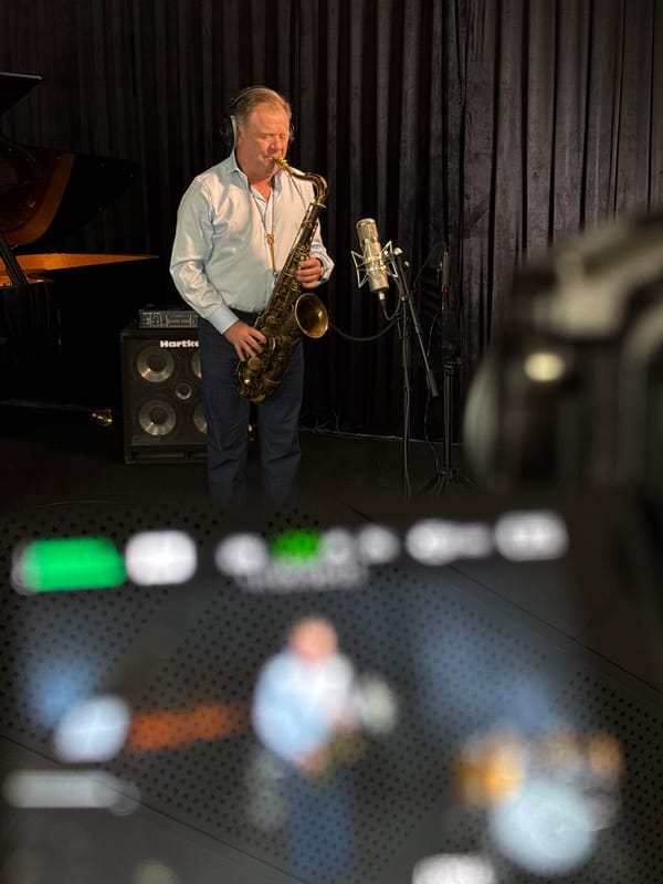 Saxophonist practices in Moscow music studio