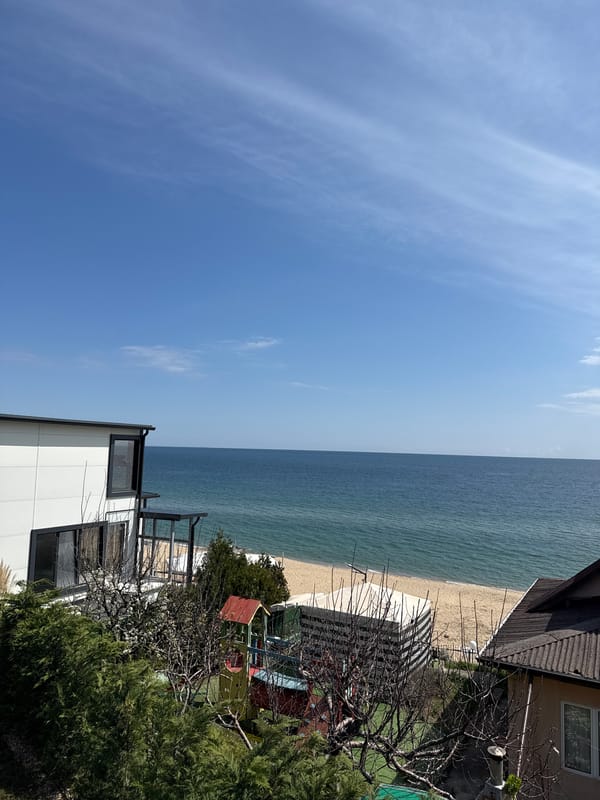 Beach scene documented in Varna, Bulgaria showing residential development