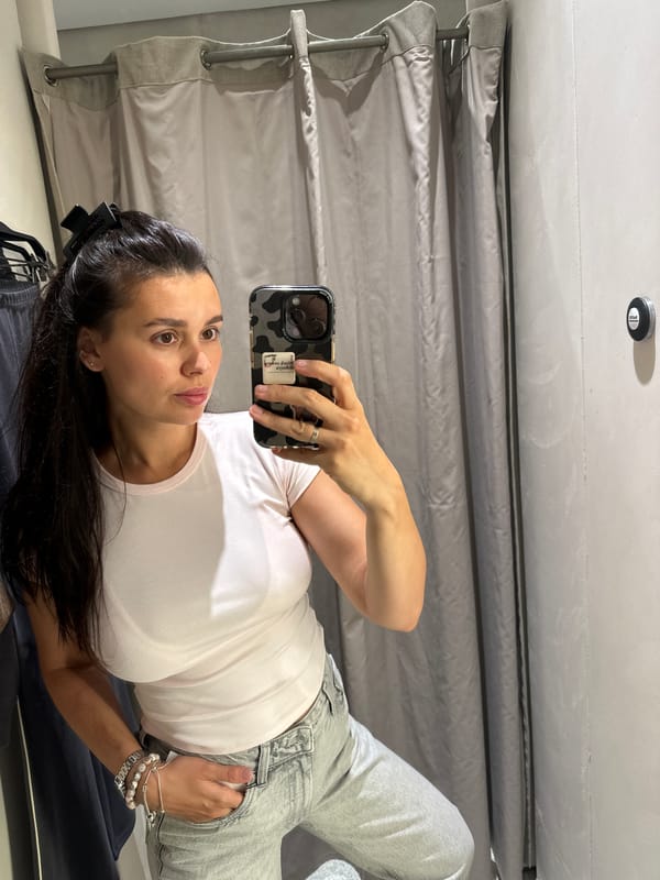 Fitting room mirror selfie in a Perm clothing store
