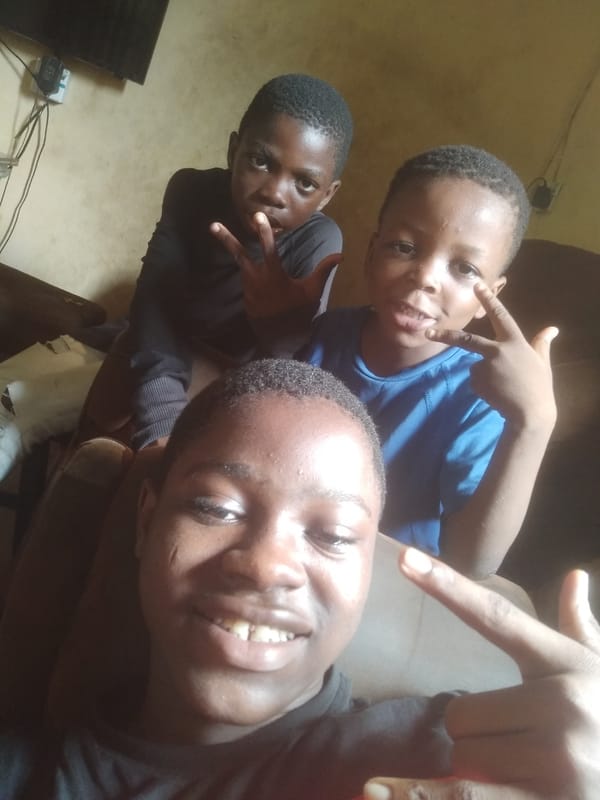 Children photographed in everyday moments across Shangisha, Nigeria