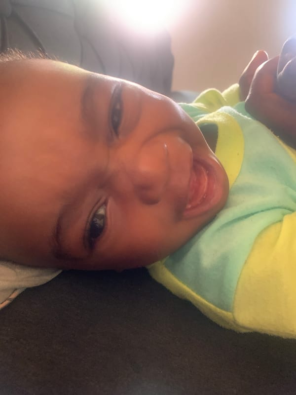 Baby photographed upside-down in Barakin Akawo, Nigeria