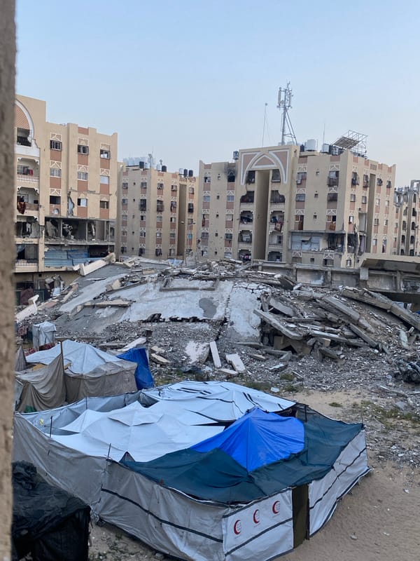 Khan Yunis families displaced, children play amid destruction