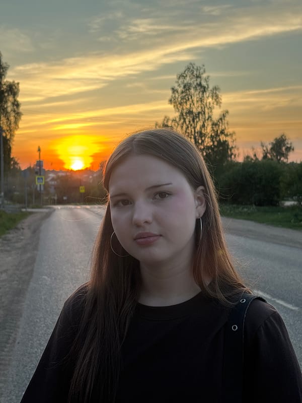 Woman poses for sunset photos in Фоки, Russia