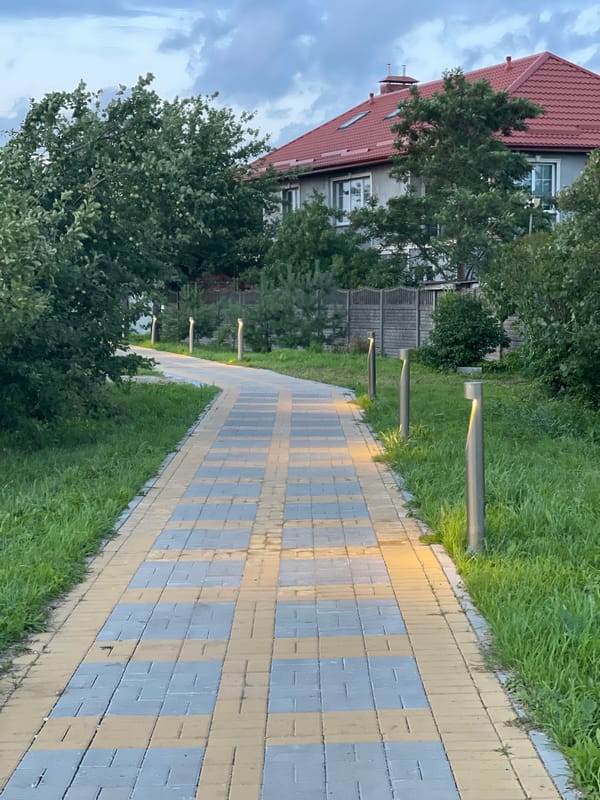 Evening stroll through Zelenogradsk under a stormy summer sky
