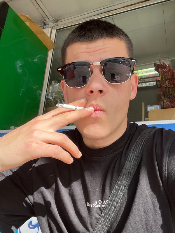 Man smoking cigarette captured in multiple photos in Sopot