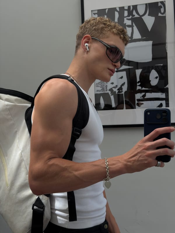 Mirror selfies in a London fitting room, same outfit, multiple angles.