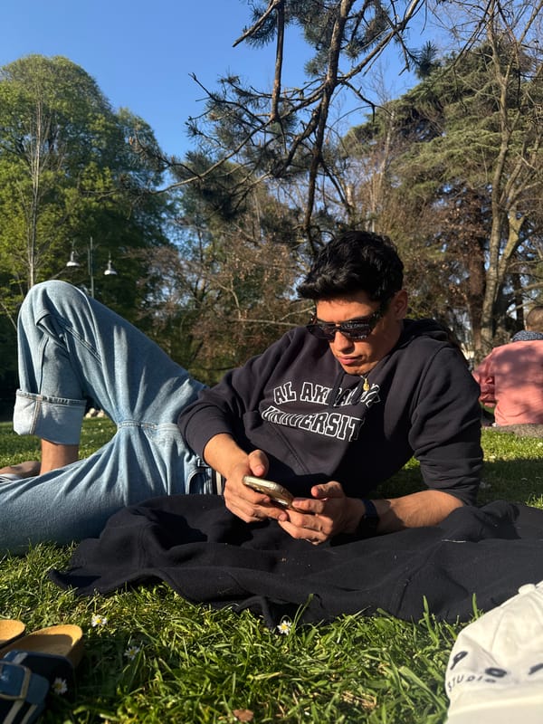 Visitor documents Sforza Castle's medieval architecture in Milan