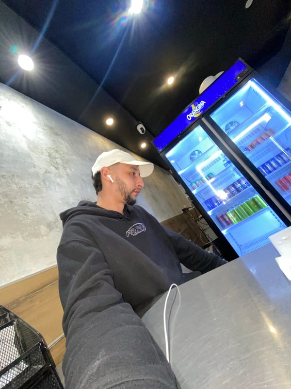 Person observed near beverage refrigerator in Schiltigheim establishment