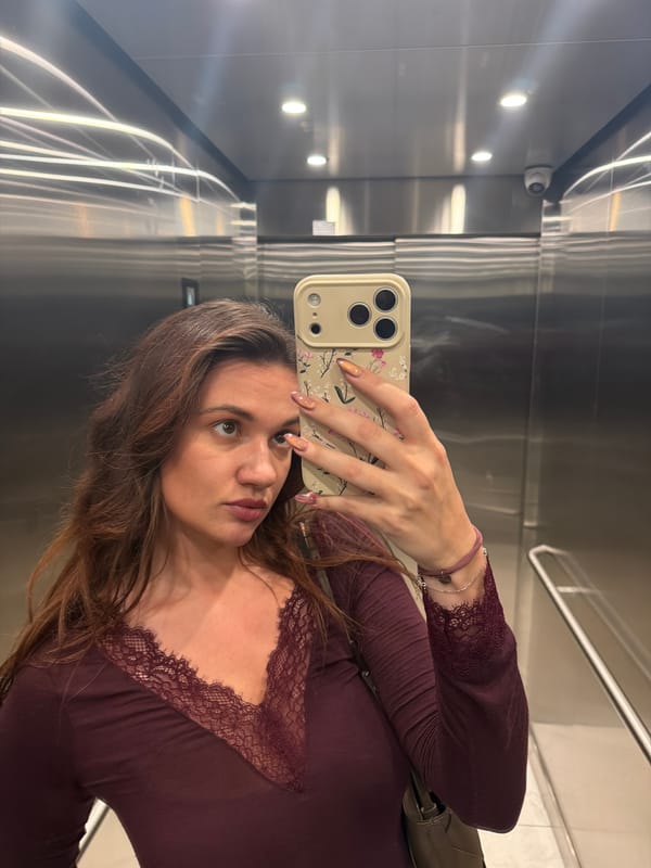 Woman Takes Selfie in Belgrade Elevator
