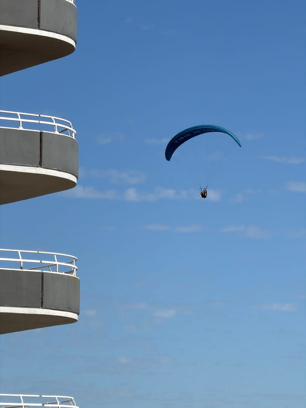 Kite surfer spotted above Cape Town buildings near Atlantic coast