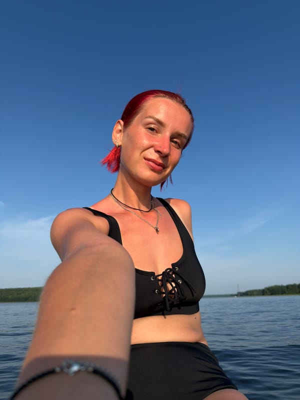 Paddleboarding on the Kama River near Chaikovsky, summer afternoon