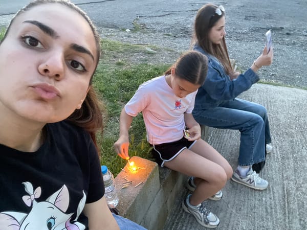Young people socialize, take selfies during twilight in Debelt, Bulgaria