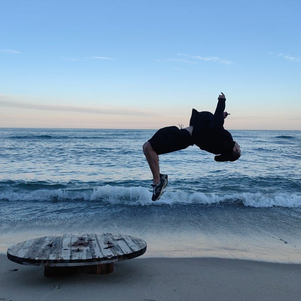 Athlete performs backflips, jumps on Varna beach near Black Sea